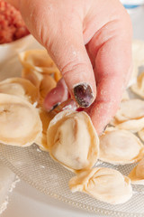 Raw and fresh is stuck on the dumplings are on the Board