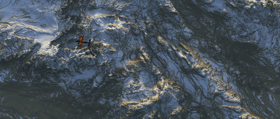 Fighter jet over snowy mountains. Aerial shot.