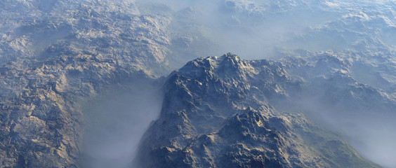 Aerial of rough bare terrain in mist.