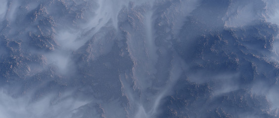 Aerial of mountain landscape with fir trees in mist.