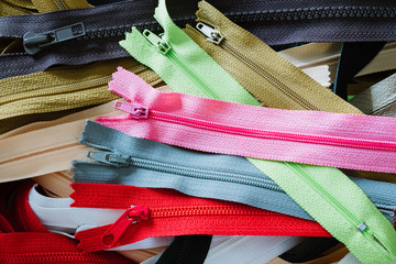 Zippers of various colors in the box
