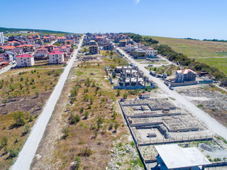 construction of cottages on the beach in Gelendzhik. Construction of the field. Construction of houses. Gelendzhik, cottage, house, field, sea, road, Black sea, pit, construction equipment, constructi