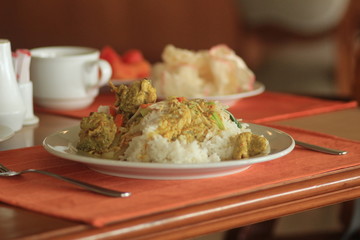 curry chicken and white rice, the concept of typical Borneo Asian food