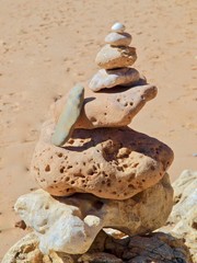 Pebbles pf stones at the beach, symbol for inner life balance in Zen meditation