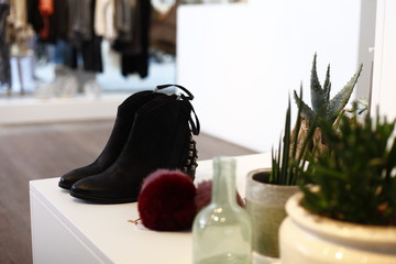 table with black shoes and decoration