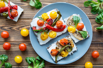 Vegetarian sandwiches with grilled vegetables, top view.