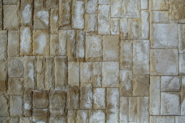 Textured background of old surface wall stone.