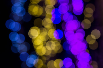 Colorful, dark background with bokeh effect. Cold bokeh circles