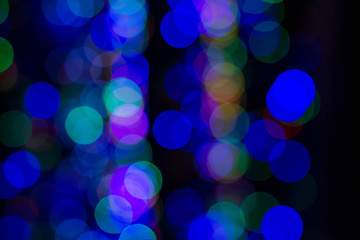 Colorful, dark background with bokeh effect. Cold bokeh circles