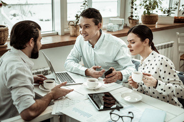 Friendly colleagues spending time together with pleasure