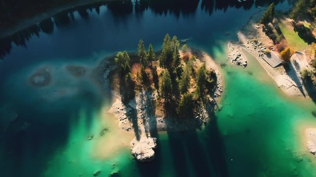 Aerial view of the Flims Caumasee at Alps mountains, 4K