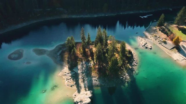 Aerial view of the Flims Caumasee at Alps mountains, 4K