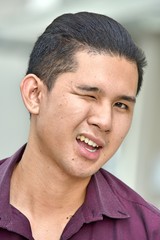 Winking Young Asian Male