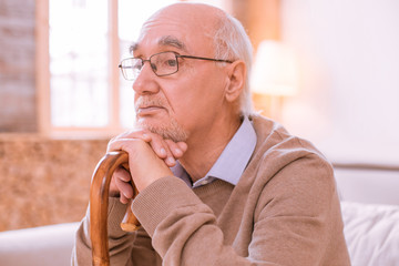 Portrait of upset man that being deep in thoughts