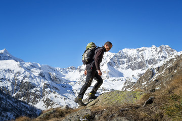 Trekking in the Alps in a beautiful sunny day. Grand Paradiso National Park. Italy