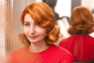 portraits of a girl with red hair and hair golivwood wave