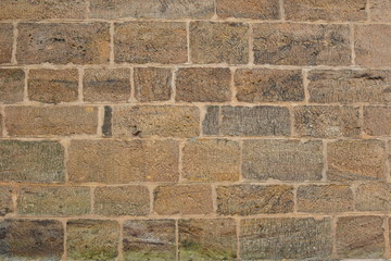 Texture of old stone wall.Dark old stones. 