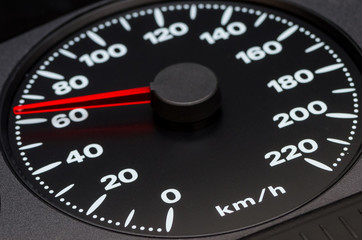 Close up shot of a speedometer in a car, 60 km/h