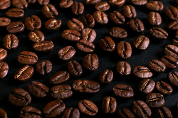 Fragrant coffee beans on rustic tabletop background. Banner copy space.