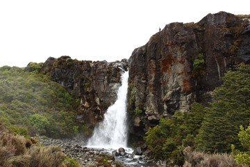 Fototapeta na wymiar Taranaki Falls, Tongariro National Park, New Zealand, North island with trekking man above