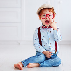 portrait of beautiful redhead toddler baby boy © Olesia Bilkei