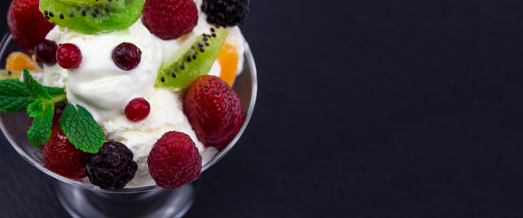 Closeup of ice cream with berries and mint. i