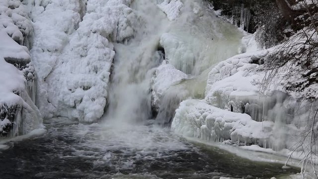 Freezing temperatures create enchanting ice waterfalls at Raymondskill Falls, Poconos, PA, middle view