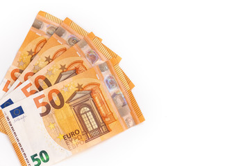 50 euro banknotes are isolated on a white background. Closeup details.