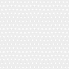 Abstract seamless pattern of small stars in white and gray colors