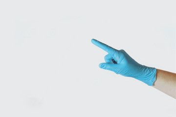 female hand in rubber glove, on white background
