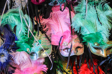 Mardi Gras masks in New Orleans, Louisiana, United States. Various multi-colored masks on display,...