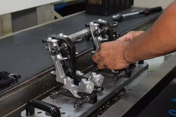 Preparation of parts of airbrush and spray gun for CNC lathe machining.