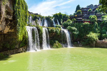 The Wangcun Waterfall at Furong Ancient Town, Hunan, China.