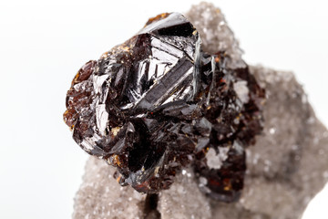 Macro of mineral Sphalerite stone on microcline on white background