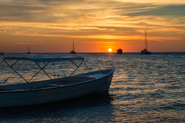 Sunset with boats at Los Roques Archipelago in Beautiful Venezuela