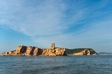 Lijubadao, one of the Changdao Islands, Shandong, China. Seen from the north with the prominent sea stack in the foreground. The island behind ia Xiaoheishandao.