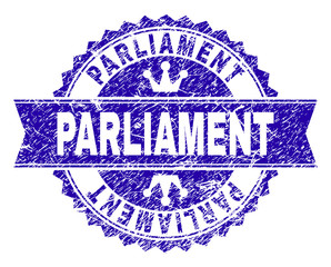 PARLIAMENT rosette stamp seal watermark with distress texture. Designed with round rosette, ribbon and small crowns. Blue vector rubber watermark of PARLIAMENT text with grunge texture.