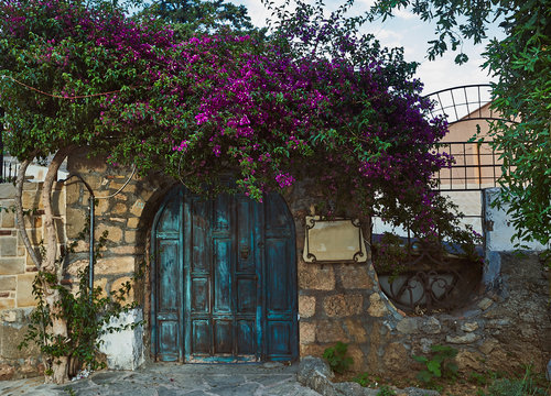 Mediterranean old hystorical city views Side Turkey blooming begonville