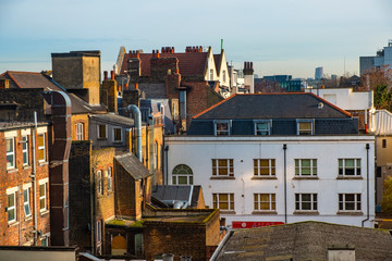 London, United Kingdom - Panoramic view of the Whitechapel district of East London with fusion of...
