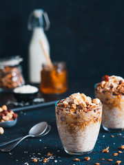 Gingerbread coconut overnight oatmeal served with granola,pecan,honey.Recipe and idea healthy vegan...