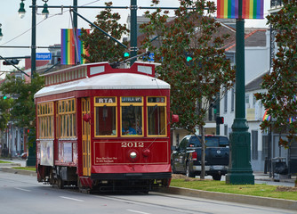Fototapeta na wymiar New Orleans red street car line Canal street