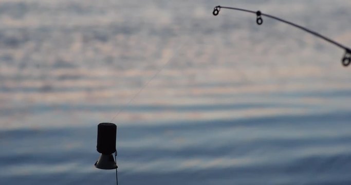 Fishing bell on river backside