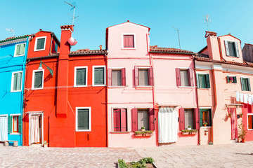 Famous Colorful houses as tourist landmark on Burano island, Venice region. Travel in Italy
