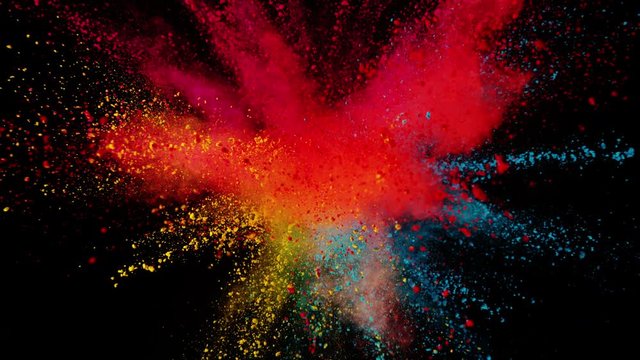 Super slow motion of coloured powder explosion isolated on black background. Filmed on high speed cinema camera, 1000 fps.