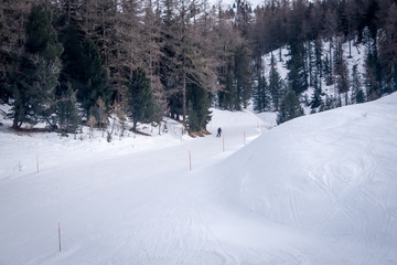 Mountain skiing - panoramic view  at the ski slopes  Aosta Valley,  Italy .