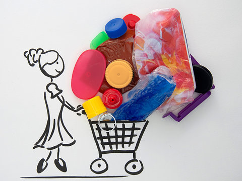 Woman With A Shopping Cart Overloaded With Plastic By Jziprian