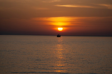 sunset sea sun ocean sky