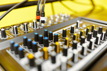 DJ console with multi-colored buttons 