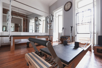 Pilates salon club with new equipment for pilates in loft style place
