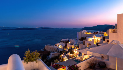 Oia village at the sunset - Aegean sea - Santorini island - Greece